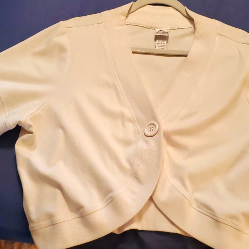 Used, white short sleeve women's cover.